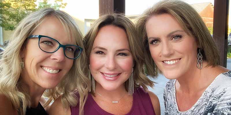 Celeste (right) and friends. No time to help a teacher.