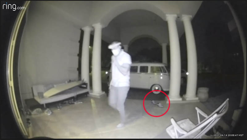 Lindani took off shoes and wore ceremonial Zulu headband. Burglars do not.